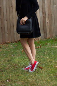 red chuck taylor all stars with a short dress