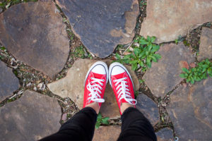 close up of red chuck taylor sneakers