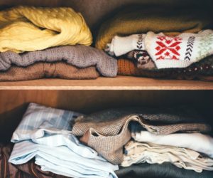 donate your clothes: how to know what goes - image of a messy cabinet